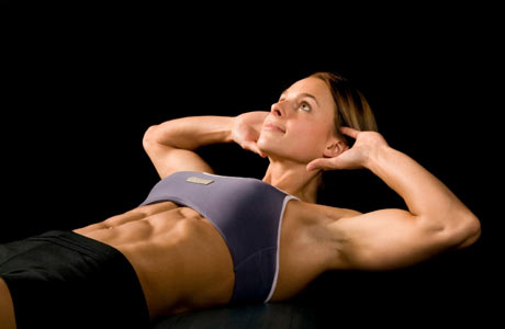 Woman Doing a Sit Up abdominal muscles